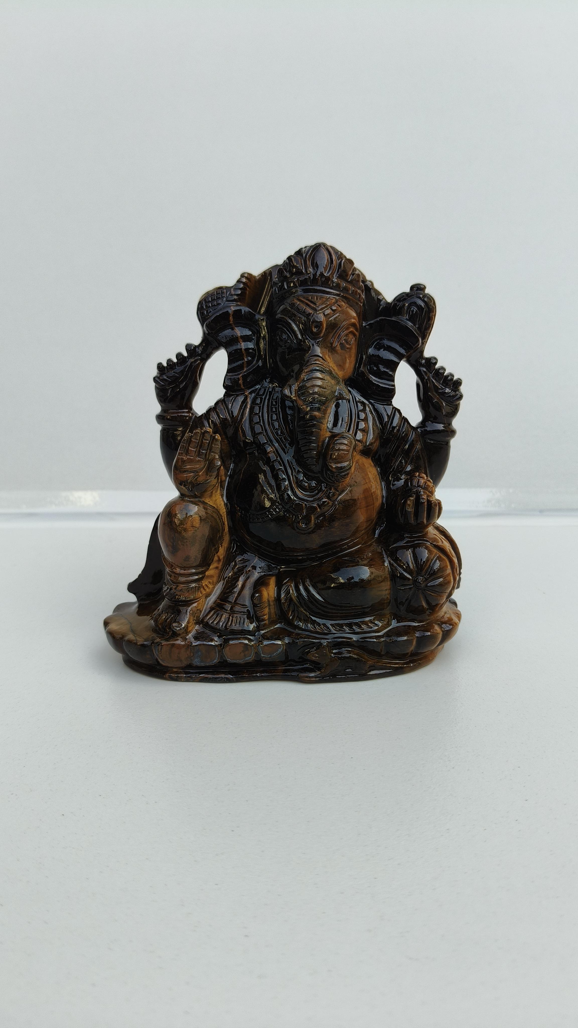 tiger eye ganesha, ganesha statue,elephant deity, ganesha carving, jade ganesha, crystal ganesha, handcraved carving, ganesha carving,jade ganesha