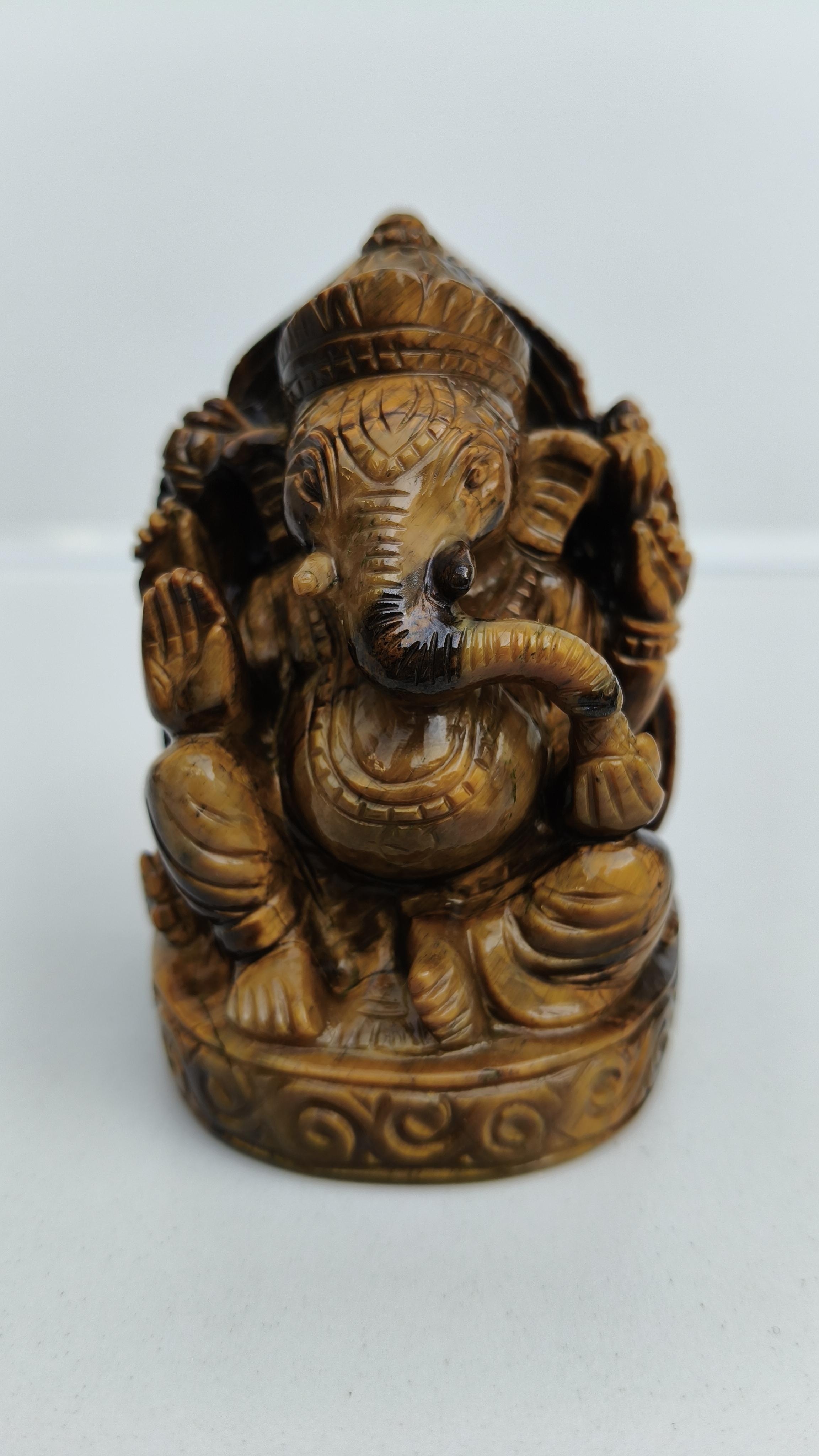 tiger eye ganesha, ganesha statue,elephant deity, ganesha carving, jade ganesha, crystal ganesha, handcraved carving, ganesha carving,jade ganesha